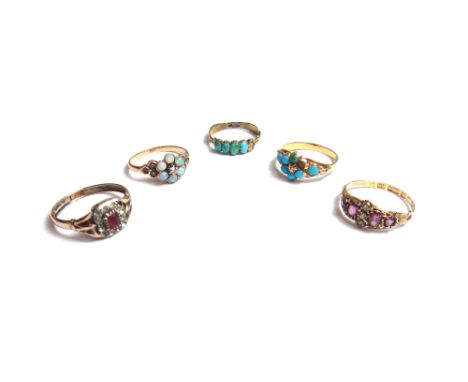 A Victorian 15ct gold, garnet and seed pearl set ring, Birmingham 1875, a gold, opal, diamond and seed pearl set cluster ring