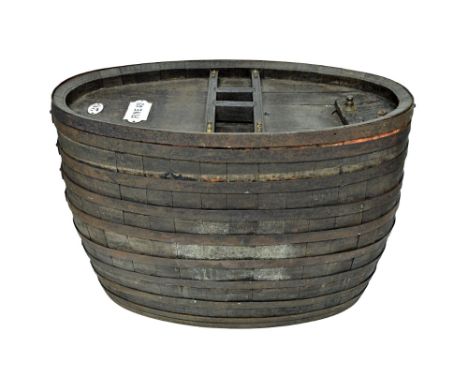 A large 19th century coopered oak wine barrel of compressed oval form with enamel plaques 26, FINE 450 CH NAVARRE & CO COGNAC