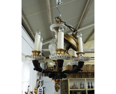 A gilt bronze six light chandelier, 20th century, with hobnail cut glass baluster stem, 36cm high. 