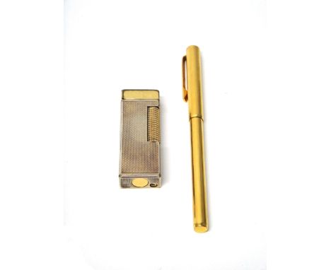 A gilt metal Dunhill rectangular gas lighter, with engine turned decoration and a Dunhill gilt metal cased fibre pen.