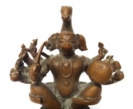A bronze figure of Hanaman, South India, 18th/19th century, the monkey headed and multi-armed god seated with crossed legs ab