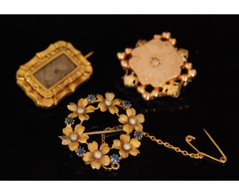 Three assorted 19th and 20th Century brooches to include a sapphire and seed pearl circular example, a memorial and a seed pe