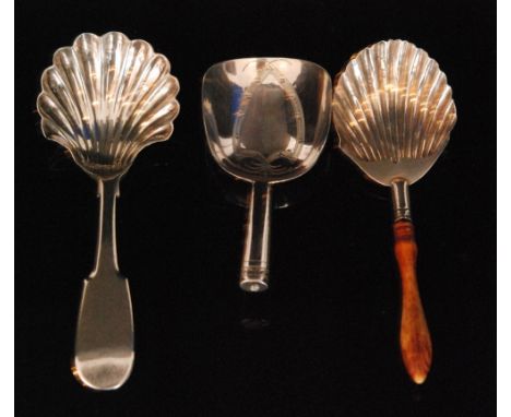 A Victorian provincial silver fiddle pattern caddy spoon with fluted shell bowl, Newcastle, no date letter, Thomas Wheatley, 