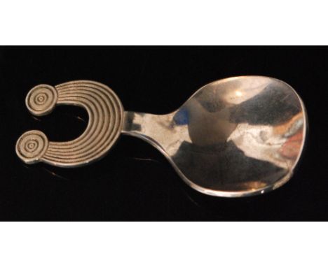 A 1973 hallmarked Irish silver commemorative caddy spoon rounded square bowl and Gleninsheen collar handle, weight 1.04oz, le