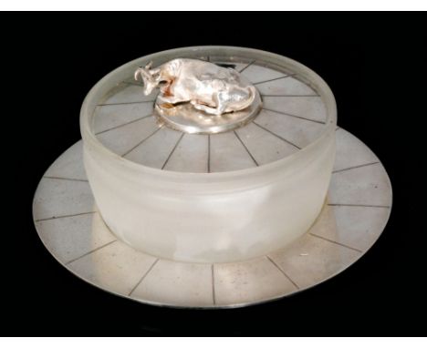 A Victorian hallmarked silver circular butter dish and stand, the frosted glass bowl below silver cover and seated figure of 