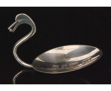 A 1980s hallmarked silver caddy spoon with oval bowl and wirework handle modelled in the form of a swan, London 1985