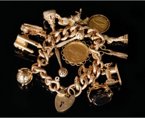 A 1990s hallmarked 9ct curb link charm bracelet fitted with thirteen various charms to include a loose mounted Victorian 1875