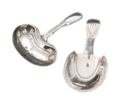 A George III hallmarked silver caddy spoon, the 'pastern' hoof bowl with bright cut border decoration, Birmingham 1806, and a