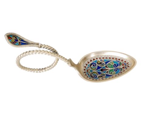 A Norwegian silver gilt and plique a jour enameled caddy spoon, the oval bowl with red, blue and yellow scrolling design lead