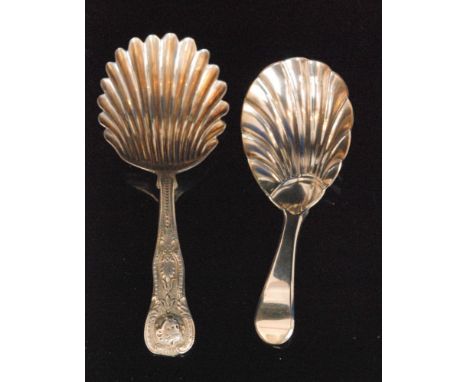 A William IV hallmarked silver caddy spoon, Queens pattern with fluted bowl and cherub's head detail, Edinburgh 1835, William