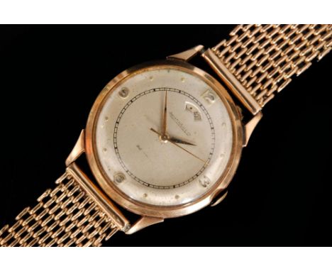A 1950s gentleman's Jaeger LeCoultre automatic wristwatch, the circular silvered dial with applied Arabic and dot hour marker