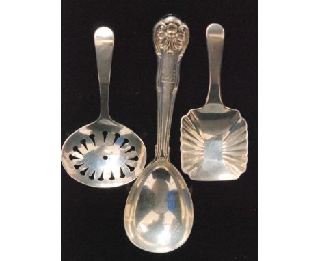 A George I hallmarked silver caddy spoon with fluted square shovel shaped bowl and plain stem, engraved initials E.W. to the 