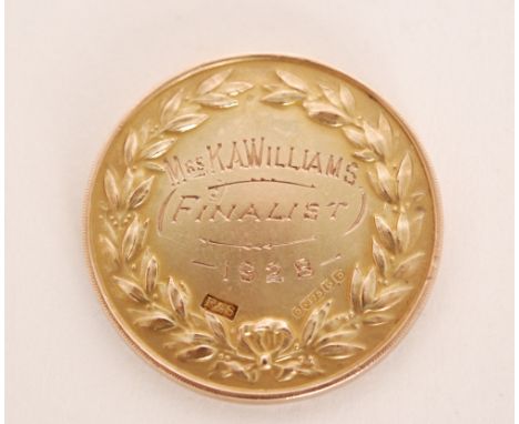 A 9ct hallmarked tennis medallion, Evening News Lawn Tennis Tournament  to Mrs K A Williams (Finalist) 1928, weight 15.5g, Bi
