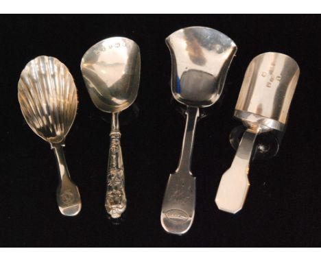 A George IV provincial silver fiddle pattern caddy spoon with shovel bowl and engraved terminal, Exeter circa 1824, Thomas Wh