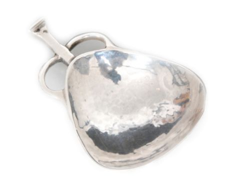 Amendment - An Arts and Crafts hallmarked silver caddy spoon with spot hammered pear shaped bowl, squared terminal and pierce