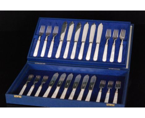 A cased set of twelve Art Deco hallmarked silver and mother of pearl handled fish knives and forks, Sheffield 1936, Viners. 