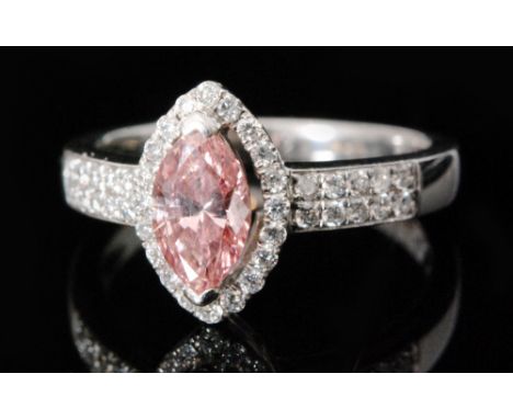 A modern 18ct hallmarked white gold pink and white diamond cluster ring, central marquise treated pink diamond, weight approx