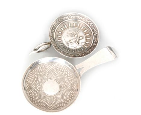 A George III hallmarked silver 'Frying Pan' caddy spoon with engine turned decoration and bifurcated handle, Birmingham 1810,