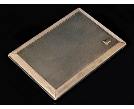 An Asprey and Co hallmarked silver and silver gilt engine turned cigarette case of rectangular outline with engine turned dec