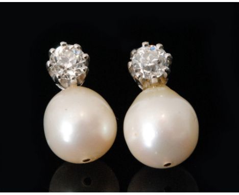 A pair of 18ct cultured pearl and diamond stud earrings, each pearl below a brilliant cut diamond with push and post fittings