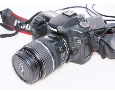 A Canon EOS 400 digital SLR camera and lens