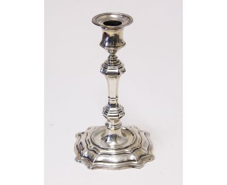 A hallmarked silver candlestick. H18cm