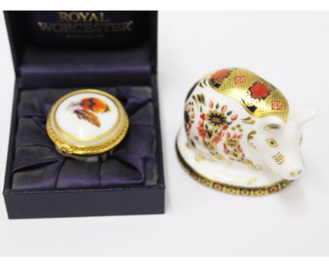 A Royal Worcester pillbox and a Royal Crown Derby pig paper weight