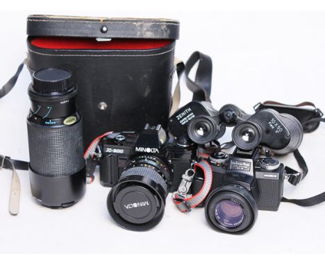 Camera equipment comprising A Minolta X-300. a Minolta mark II, a Minolta lens and a pair of Zenith binoculars