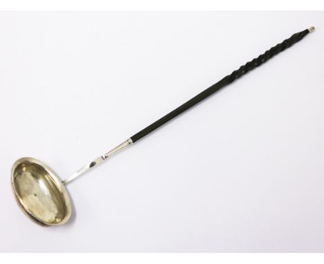 A white metal punch ladle with twist horn handle. 19th century. L36cm