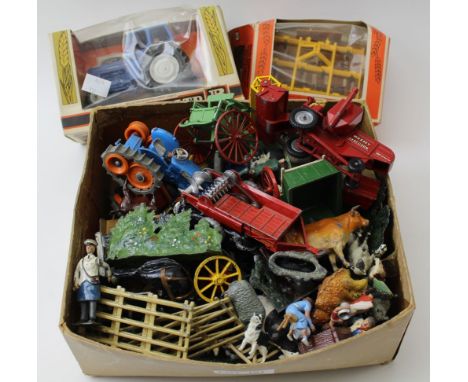 A Britains Ltd Ford tractor in original box, other farm equipment, farmyard animals etc