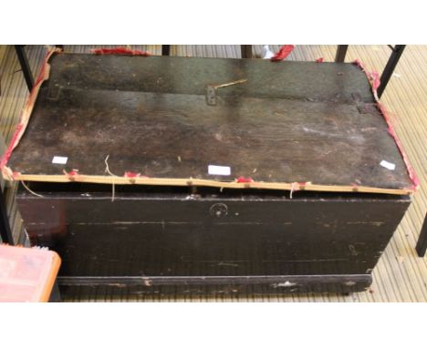 A dark wood trunk in need of restoration