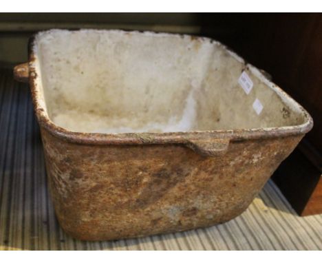 A cast iron square planter