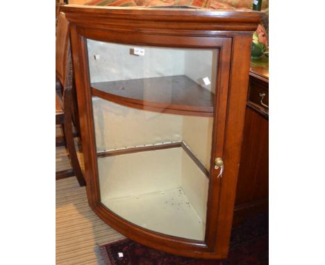 20th century glass bow front corner cupboard