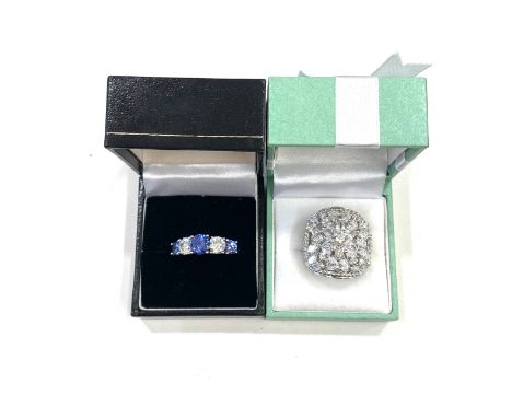 2 QVC silver rings set with CZ'sring sizes Q and R