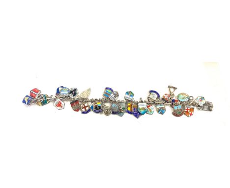Vintage silver and enamel charm bracelet, souvenir travel shield charms, approximate weight 46g