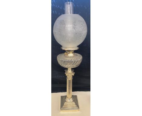 Antique silver plated Nelson column oil lamp, glass shade and font, approximate height 27 inches