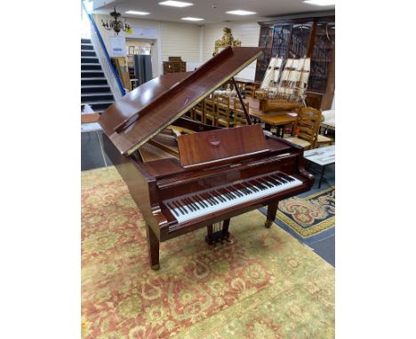 A Petrof 6ft 2in Model III grand piano, mahogany cased, serial number 513137 circa 1994.