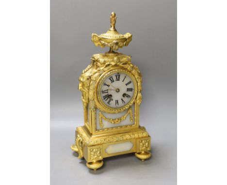 A 19th century French ormolu and alabaster mounted mantel clock with key and pendulum - 38cm high