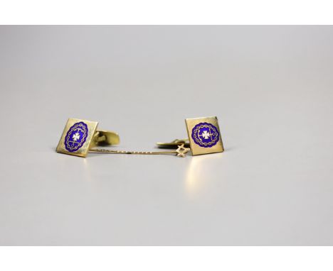 A pair of 585 and enamelled cufflinks, gross 13.8 grams and a yellow metal masonic stick pin.