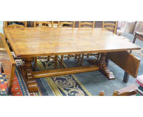 A good 18th century style Belvedere Furniture rectangular light oak refectory dining table, with end extensions, length 305cm