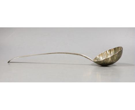 A George III silver Old English beaded pattern soup ladle, William Turton?, London, 1771, 33cm, with shell bowl, 127 grams.