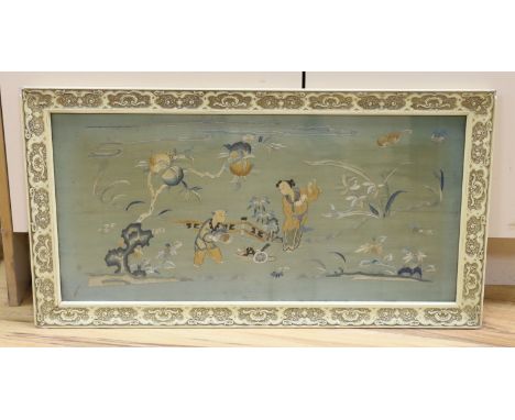A 19th century framed Chinese polychrome silk embroidered panel,68 cms wide x 34 cms high.