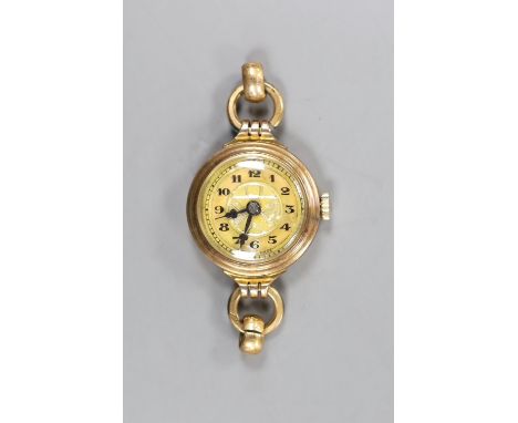 A lady's 9ct gold manual wind wrist watch, no strap, gross 9.5 grams.