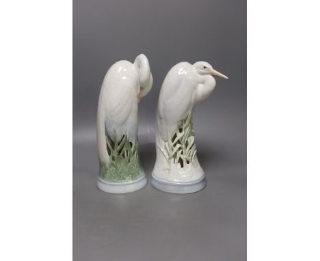 Two Royal Copenhagen figures of herons, model number 3002 and 532,  28 cms high.