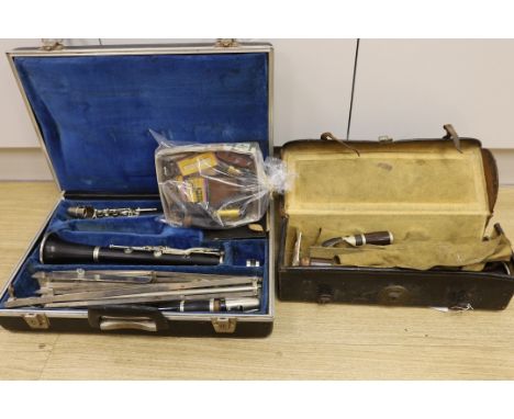 A French Buffet clarinet and two 19th century 'Simple System' clarinets, cased as one