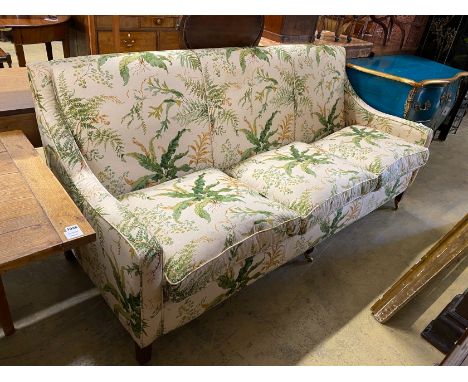 A “Highly Sprung Ltd” Colefax and Fowler fabric three seater sofa with feather cushion seats, width 210, depth 86cm, height 9