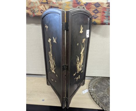 An early 20th century Shibayama type bone mounted lacquer two fold table screen, each panel width 41cm, height 85cm