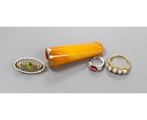 An 18ct and graduated cultured pearl set half hoop ring, size O/P, gross 5.2 grams, an Edwardian yellow metal, enamel, seed p