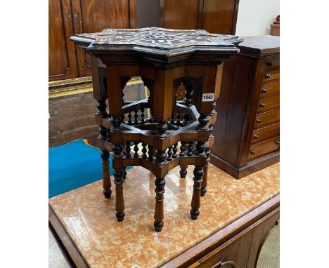 A Moorish mother of pearl inlaid occasional table, width 50cm, height 58cm