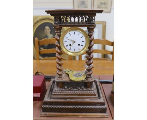 A 19th century French rosewood portico clock and stand, total height 53.5 cm